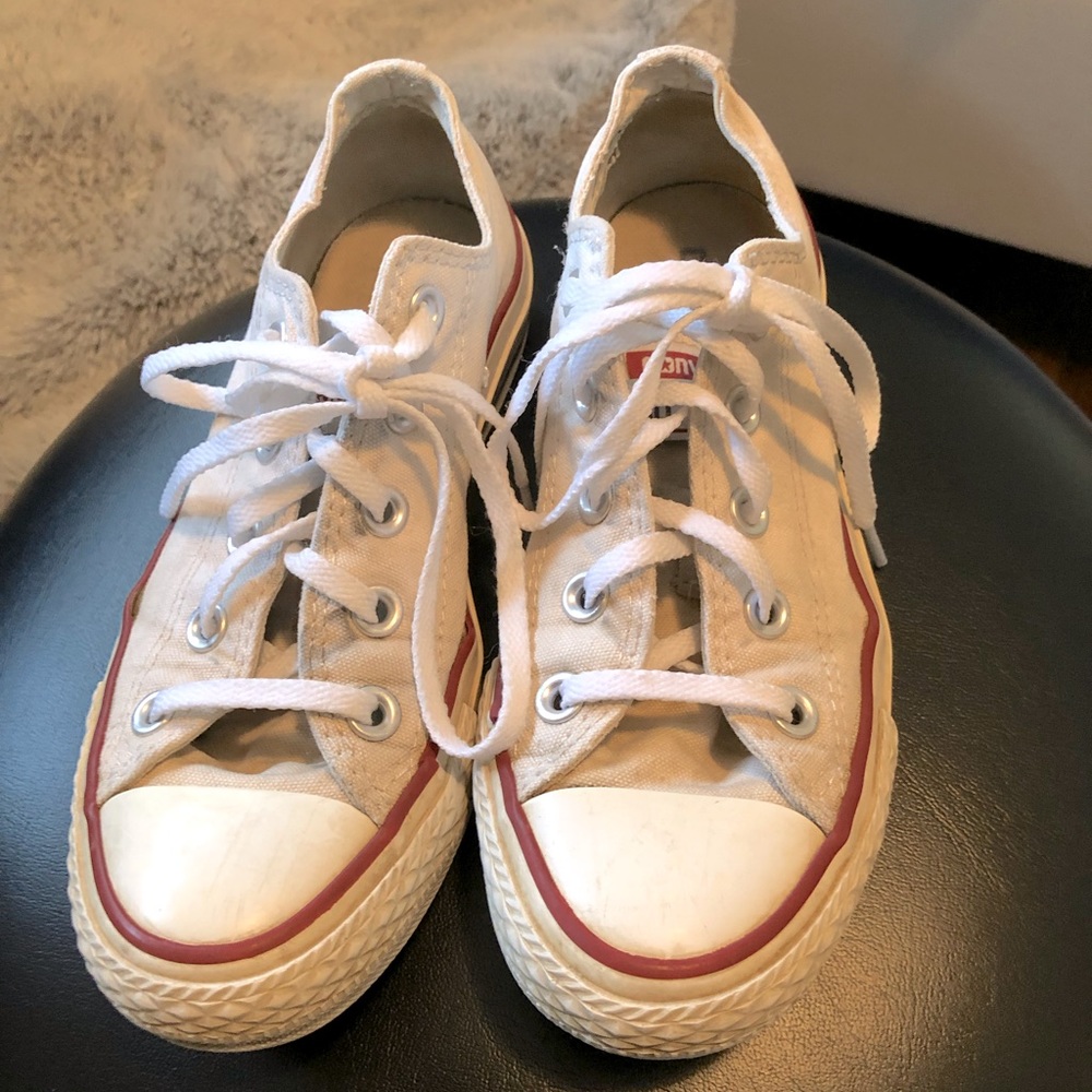 Converse sneakers.Washed them in the washing machine, not pure white anymore.